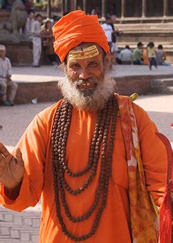 Why Hindu saints wear saffron robes .